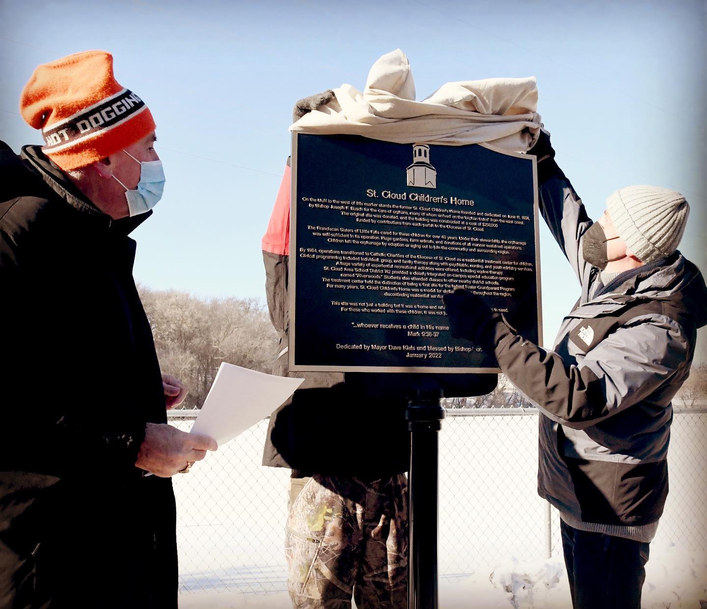 "I’m so pleased that we can do this as a real memorial,” Bishop Donald Kettler said during the unveiling of a historical marker honoring the former St. Cloud Children’s Home Jan. 20. “People will see this and remember,” he said.

The marker is located on the Beaver Island Trail along the Mississippi River in St. Cloud with the bell tower of the Children's Home building visible in the distance behind it. During the event, the marker was dedicated by St. Cloud Mayor Dave Kleis and blessed by Bishop Kettler.

The  St. Cloud Children’s Home was founded in 1924 for the care of orphans and the Franciscan Sisters of Little Falls were involved there for over 40 years. In the mid-1960s, operations transitioned to Catholic Charities of the Diocese of St. Cloud, MN as a residential treatment center for youth. The diocese sold the Children’s Home property in the fall of 2020. #beaverislandtrail #history #stcloudmn #catholicsofinstagram #visitstcloud